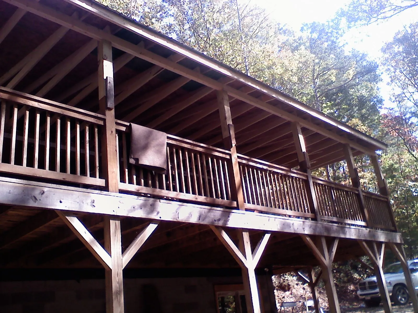 Timber framing under a new elevated porch and deck — Roof Leak Repair in North Grosvenordale by Roofing Brothers